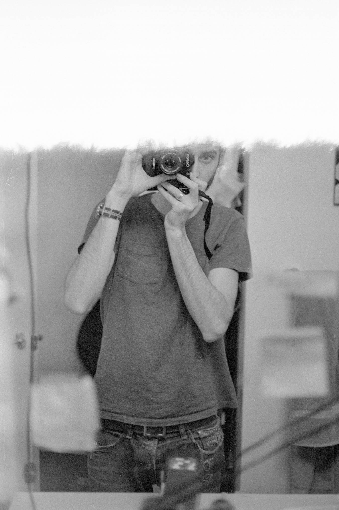 Black and white First of the roll self-portrait on Ilford FP+4 film